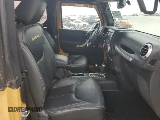 2014 Jeep Wrangler Sahara with VIN 1C4AJWBG8EL144691, listed as a Copart auction lot 71172514 with 111,322 mi miles and Salvage title. Bid and sale history available at DreamBid. Image 11.