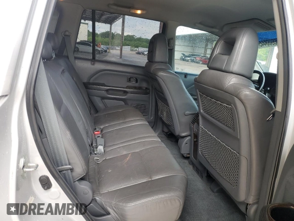 2003 Honda Pilot EX z VIN 2HKYF18593H563871, wystawiony jako Copart lot #55968445 z przebiegiem 213 637 mil mil oraz Szkoda całkowita • Salvage title. Historia ofert i sprzedaży dostępna na DreamBid. Obrazek 10.