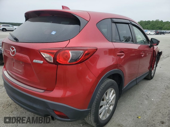 2014 Mazda CX-5 Touring z VIN JM3KE4CY3E0382106, wystawiony jako Copart lot #55521645 z przebiegiem 84 539 mil mil oraz Szkoda całkowita • Salvage title. Historia ofert i sprzedaży dostępna na DreamBid. Obrazek 3.