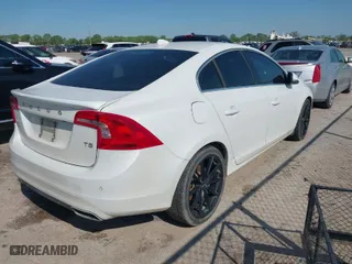 2015 Volvo S60 T5 Drive-E Premier with VIN YV140MFK8F2338058, listed as a IAAI auction lot 41925114 with NaN miles. Bid and sale history available at carsss.com. Image 4.