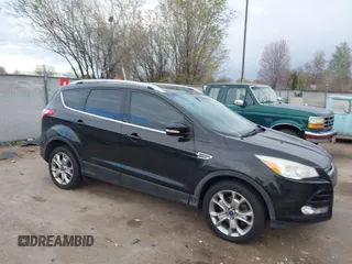 2015 Ford Escape Titanium with VIN 1FMCU9J96FUA27221, listed as a IAAI auction lot 41925276 with 180,758 mi miles. Bid and sale history available at carsss.com. Image 1.