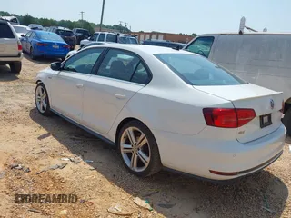2017 Volkswagen Jetta GLI with VIN 3VW4T7AJ4HM285574, listed as a IAAI auction lot 42560691 with 80,579 mi miles and . Bid and sale history available at DreamBid. Image 3.