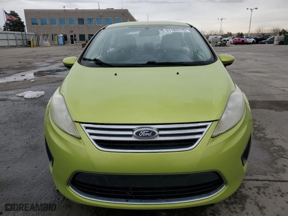 2011 Ford Fiesta SE with VIN 3FADP4BJ7BM144452, listed as a Copart auction lot 51183115 with 122,910 mi miles and Salvage Title. Bid and sale history available at carsss.com. Image 5.