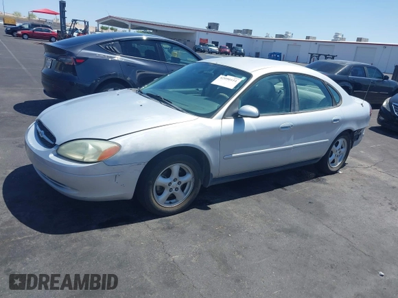 2003 Ford Taurus SE Standard with VIN 1FAFP53UX3G268265, listed as a IAAI auction lot 42090151 with 139,734 mi miles. Bid and sale history available at carsss.com. Image 13.