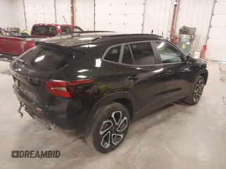 2024 Chevrolet Trax 2RS with VIN KL77LJE23RC010648, listed as a IAAI auction lot 41883737 with 30,141 mi miles and . Bid and sale history available at DreamBid. Image 4.