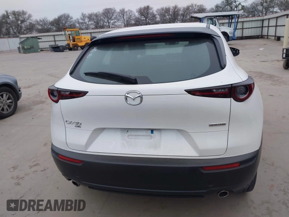 2022 Mazda CX-30 S with VIN 3MVDMBALXNM422418, listed as a IAAI auction lot 41531552 with 21,909 mi miles and . Bid and sale history available at carsss.com. Image 16.