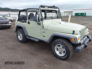 2001 Jeep Wrangler Sport with VIN 1J4FA49S91P354668, listed as a IAAI auction lot 41883227 with 197,043 mi miles and . Bid and sale history available at carsss.com. Image 1.