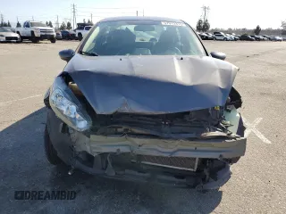 2019 Ford Fiesta SE z VIN 3FADP4BJ4KM106189, wystawiony jako Copart lot #57913315 z przebiegiem Nie podano mil oraz Szkoda całkowita • Salvage title. Historia ofert i sprzedaży dostępna na DreamBid. Obrazek 5.