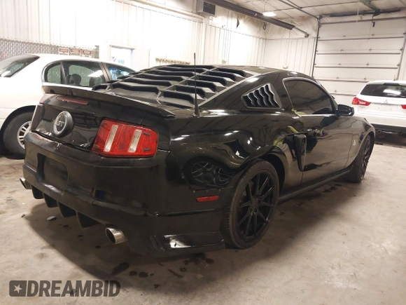 2011 Ford Mustang V6 with VIN 1ZVBP8AM4B5152094, listed as a IAAI auction lot 41763973 with 100,744 mi miles and . Bid and sale history available at carsss.com. Image 4.