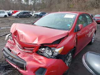 2013 Toyota Corolla L with VIN 5YFBU4EE0DP215690, listed as a IAAI auction lot 41569097 with 162,820 mi miles. Bid and sale history available at carsss.com. Image 2.