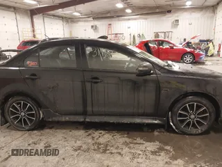 2015 Mitsubishi Lancer SE with VIN JA32V2FW6FU019508, listed as a IAAI auction lot 41633196 with 91,758 mi miles. Bid and sale history available at carsss.com. Image 13.