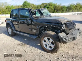 2020 Jeep Wrangler Unlimited Sport S with VIN 1C4HJXDG8LW207687, listed as a Copart auction lot 53818565 with 72,749 mi miles and Salvage title. Bid and sale history available at DreamBid. Image 4.
