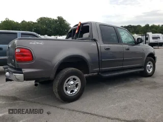 2002 Ford F-150 XLT with VIN 1FTRW08662KC45830, listed as a Copart auction lot 69485294 with 218,248 mi miles and Salvage Title. Bid and sale history available at carsss.com. Image 3.
