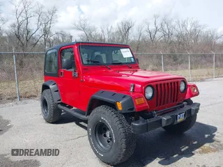 2002 Jeep Wrangler X with VIN 1J4FA39S02P739211, listed as a IAAI auction lot 41665910 with 144,118 mi miles. Bid and sale history available at carsss.com. Image 1.