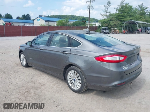 2014 Ford Fusion SE Hybrid with VIN 3FA6P0LU3ER152517, listed as a IAAI auction lot 42801042 with 209,898 mi miles and . Bid and sale history available at DreamBid. Image 3.