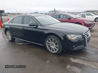 2013 Audi A8 L 4.0L with VIN WAUR2AFD5DN018209, listed as a IAAI auction lot 41598191 with 77,519 mi miles. Bid and sale history available at carsss.com. Image 1.