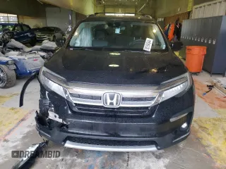 2020 Honda Pilot Touring 8-Passenger with VIN 5FNYF6H90LB043055, listed as a Copart auction lot 85194544 with 82,144 mi miles and Salvage Title. Bid and sale history available at DreamBid. Image 5.