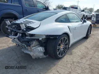 2016 Porsche 911 Turbo with VIN WP0AD2A97GS166077, listed as a IAAI auction lot 41568972 with 26,064 mi miles. Bid and sale history available at carsss.com. Image 4.