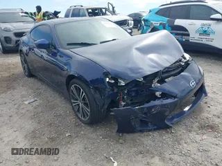 2014 Scion FR-S z VIN JF1ZNAA11E8704728, wystawiony jako IAAI lot #42321317 z przebiegiem 102 764 mil mil oraz . Historia ofert i sprzedaży dostępna na DreamBid. Obrazek 1.