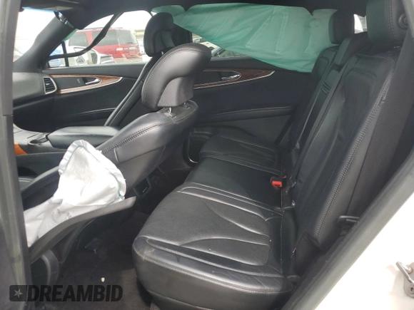 2016 Lincoln MKX Reserve with VIN 2LMTJ6LR9GBL24662, listed as a Copart auction lot 54235015 with 159,581 mi miles and Salvage Title. Bid and sale history available at DreamBid. Image 11.