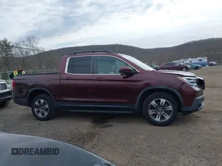 2018 Honda Ridgeline RTL-T with VIN 5FPYK3F69JB010983, listed as a IAAI auction lot 41781716 with 45,494 mi miles and . Bid and sale history available at DreamBid. Image 13.