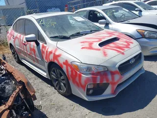 2016 Subaru WRX Premium with VIN JF1VA1E61G9811288, listed as a IAAI auction lot 42018179 with 136,598 mi miles and . Bid and sale history available at DreamBid. Image 1.