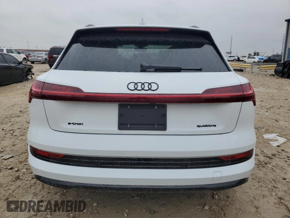2022 Audi e-tron Premium with VIN WA1AAAGE4NB042461, listed as a Copart auction lot 83235624 with 10,991 mi miles and Salvage title. Bid and sale history available at DreamBid. Image 6.