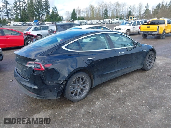 2019 Tesla Model 3 Mid Range with VIN 5YJ3E1EA4KF305611, listed as a IAAI auction lot 41916738 with 59,101 mi miles and . Bid and sale history available at carsss.com. Image 4.