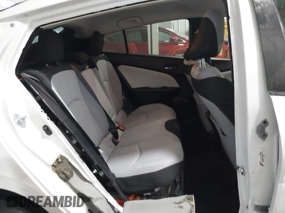 2021 Toyota Prius LE with VIN JTDL9MFU9M3025214, listed as a IAAI auction lot 41375860 with 76,259 mi miles and . Bid and sale history available at DreamBid. Image 8.