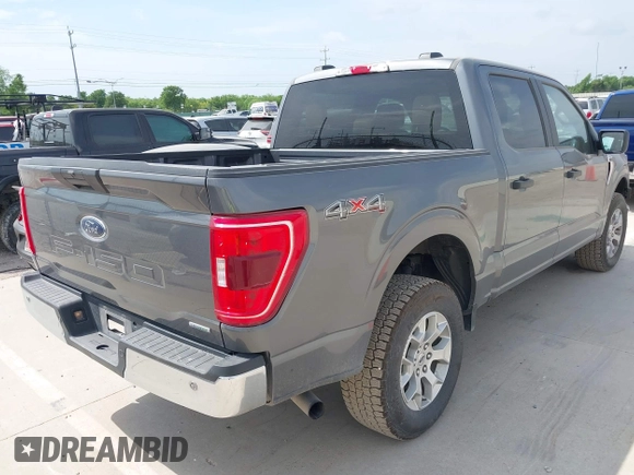 2023 Ford F-150 XL with VIN 1FTFW1E87PKF04735, listed as a IAAI auction lot 42048913 with 54,893 mi miles. Bid and sale history available at carsss.com. Image 4.