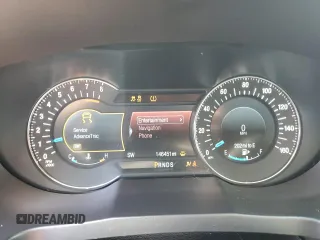 2016 Ford Explorer Platinum z VIN 1FM5K8HT8GGC52573, wystawiony jako Copart lot #57137975 z przebiegiem 146 451 mil mil oraz Szkoda całkowita • Salvage title. Historia ofert i sprzedaży dostępna na DreamBid. Obrazek 9.
