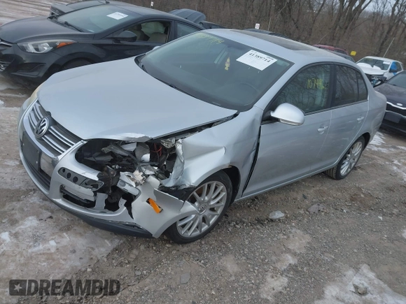 2008 Volkswagen Jetta Wolfsburg Edition with VIN 3VWRJ71K18M185744, listed as a IAAI auction lot 41389714 with 107,446 mi miles and . Bid and sale history available at DreamBid. Image 2.