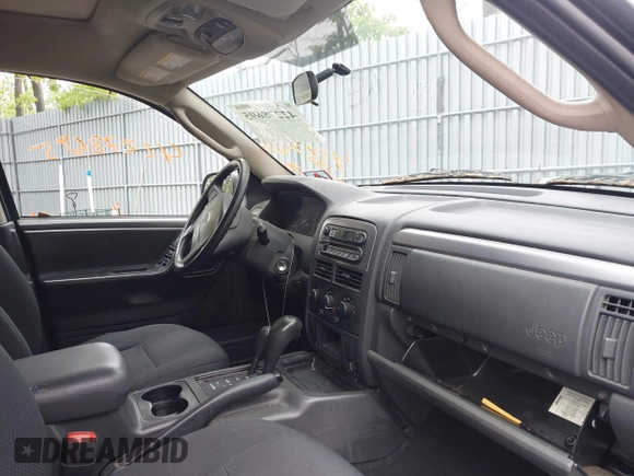 2003 Jeep Grand Cherokee Laredo z VIN 1J4GW48S73C553686, wystawiony jako IAAI lot #42278695 z przebiegiem 154 374 mil mil oraz . Historia ofert i sprzedaży dostępna na DreamBid. Obrazek 5.