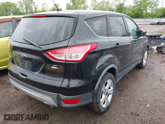 2015 Ford Escape SE with VIN 1FMCU9GX5FUB01864, listed as a IAAI auction lot 42199405 with 114,776 mi miles and . Bid and sale history available at DreamBid. Image 4.