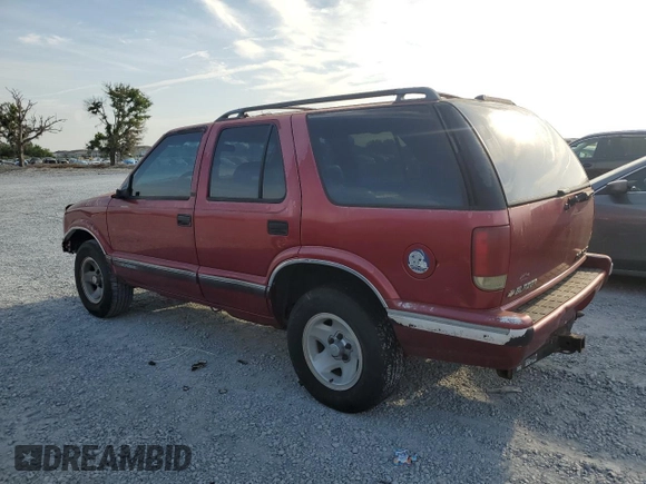 1996 Chevrolet Blazer z VIN 1GNCS13W7T2150216, wystawiony jako Copart lot #54006685 z przebiegiem 1 518 487 mil mil oraz Szkoda całkowita • Salvage title. Historia ofert i sprzedaży dostępna na DreamBid. Obrazek 2.