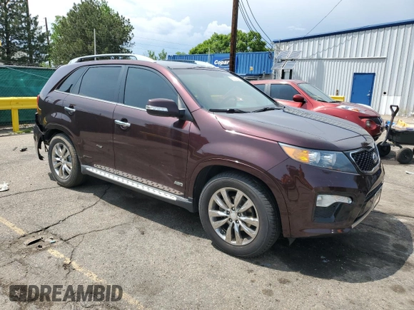 2013 Kia Sorento SX with VIN 5XYKWDA2XDG363999, listed as a Copart auction lot 58200985 with 69,056 mi miles and Salvage title. Bid and sale history available at DreamBid. Image 4.