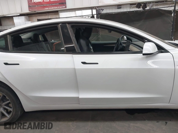 2023 Tesla Model 3 Long Range with VIN 5YJ3E1EB3PF603955, listed as a IAAI auction lot 41915541 with 33,691 mi miles and . Bid and sale history available at DreamBid. Image 13.