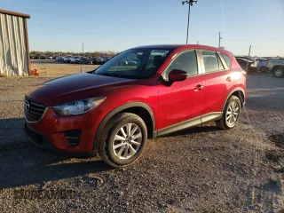 2016 Mazda CX-5 Sport with VIN JM3KE2BYXG0805613, listed as a Copart auction lot 86968884 with 114,524 mi miles and Clean Title. Bid and sale history available at carsss.com. Image 1.