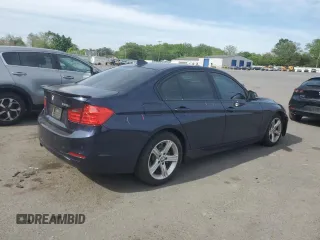 2013 BMW 3 Series 328i xDrive with VIN WBA3B5C52DJ599198, listed as a Copart auction lot 56463365 with 98,808 mi miles and Salvage title. Bid and sale history available at DreamBid. Image 3.
