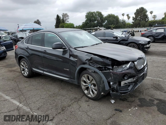 2018 BMW X4 xDrive28i with VIN 5UXXW3C57J0T82047, listed as a Copart auction lot 55988675 with 103,692 mi miles and Salvage title. Bid and sale history available at DreamBid. Image 4.