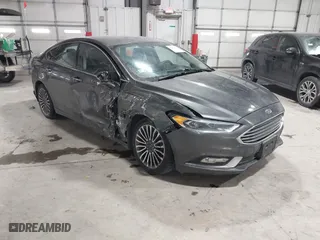 2018 Ford Fusion Hybrid Titanium with VIN 3FA6P0RU1JR117010, listed as a IAAI auction lot 41603439 with 124,151 mi miles. Bid and sale history available at carsss.com. Image 1.