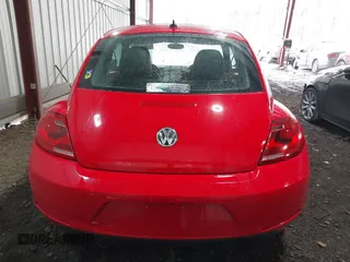 2012 Volkswagen Beetle 2.5L with VIN 3VWJX7AT0CM656148, listed as a IAAI auction lot 41738742 with 53,920 mi miles. Bid and sale history available at carsss.com. Image 16.