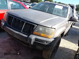 1999 Jeep Grand Cherokee Laredo with VIN 1J4GW58S0XC678864, listed as a IAAI auction lot 37593033 with Not provided miles and . Bid and sale history available at DreamBid. Image 2.