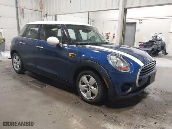 2017 MINI Hardtop 4 Door Cooper with VIN WMWXU1C51H2E18017, listed as a IAAI auction lot 41355171 with 32306 miles. Bid and sale history available at carsss.com. Image 1.