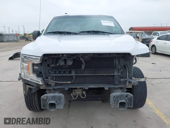 2018 Ford F-150 XL with VIN 1FTMF1CB4JKF54148, listed as a IAAI auction lot 42275439 with 157,811 mi miles and . Bid and sale history available at DreamBid. Image 13.