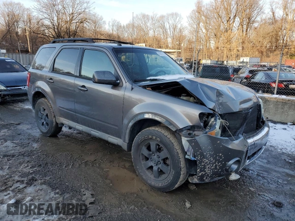 2009 Ford Escape Limited with VIN 1FMCU94749KB55161, listed as a Copart auction lot 41877015 with 178,663 mi miles and Salvage title. Bid and sale history available at DreamBid. Image 4.