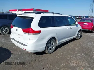 2013 Toyota Sienna LE AAS with VIN 5TDKK3DC2DS354582, listed as a IAAI auction lot 41360766 with 169,978 mi miles. Bid and sale history available at carsss.com. Image 4.