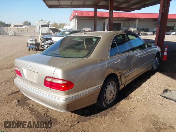 2001 Mercedes-Benz E-Class with VIN WDBJF65J11B232599, listed as a IAAI auction lot 41517879 with 173,366 mi miles. Bid and sale history available at carsss.com. Image 4.