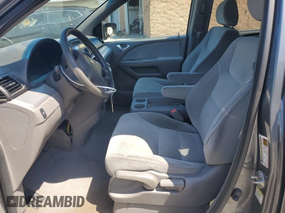 2010 Honda Odyssey LX with VIN 5FNRL3H22AB062721, listed as a Copart auction lot 62379995 with 138,080 mi miles and Salvage title. Bid and sale history available at DreamBid. Image 7.