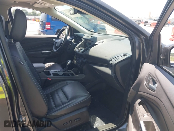 2018 Ford Escape Titanium with VIN 1FMCU9J99JUD43804, listed as a IAAI auction lot 41101250 with 56,438 mi miles and . Bid and sale history available at DreamBid. Image 5.